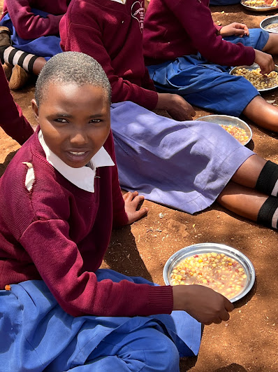 Girl eating a meal at school